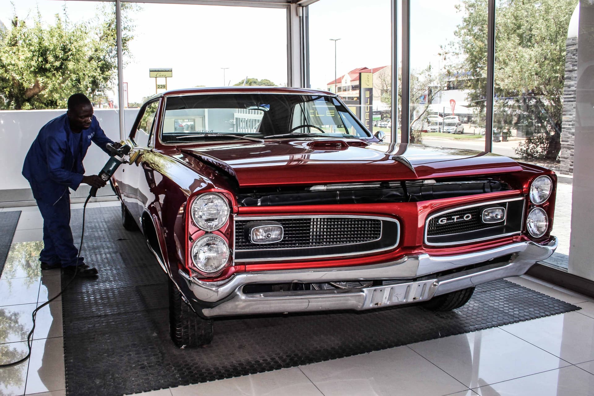 Final polish on a restored Pontiac GTO